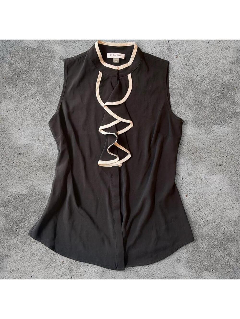 Calvin Klein black and white button up sleeveless blouse